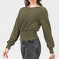 A Knit Top Featuring Wide Neckline