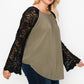 Solid Top Featuring Flattering Lace Bell Sleeves