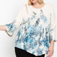 Print Top Featuring A Round Neckline And 3/4 Bell Sleeves