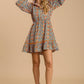 Collared neckline button down floral print dress with crochet trimmed details